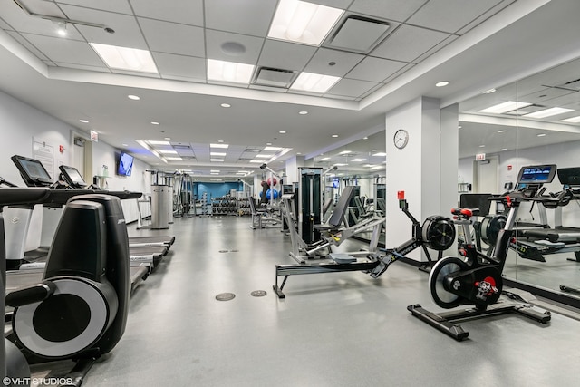 workout area featuring a drop ceiling