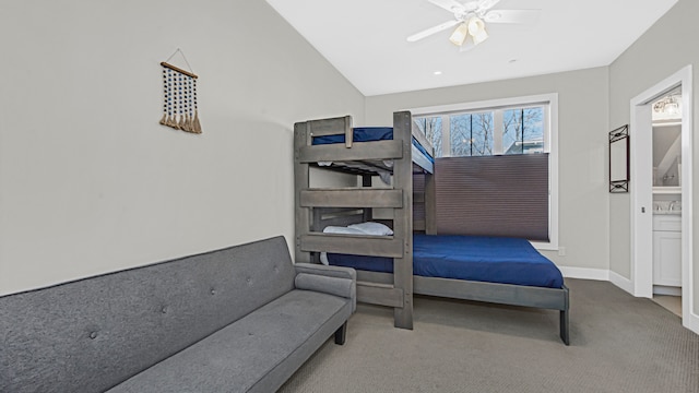 bedroom featuring ceiling fan, light colored carpet, and high vaulted ceiling