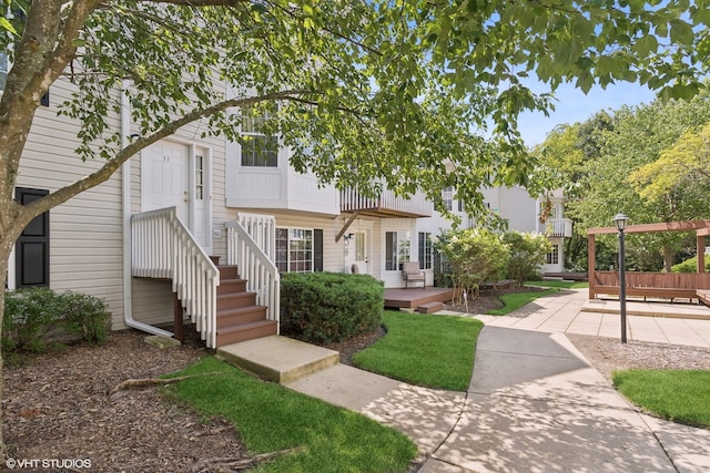 view of front of property with a deck