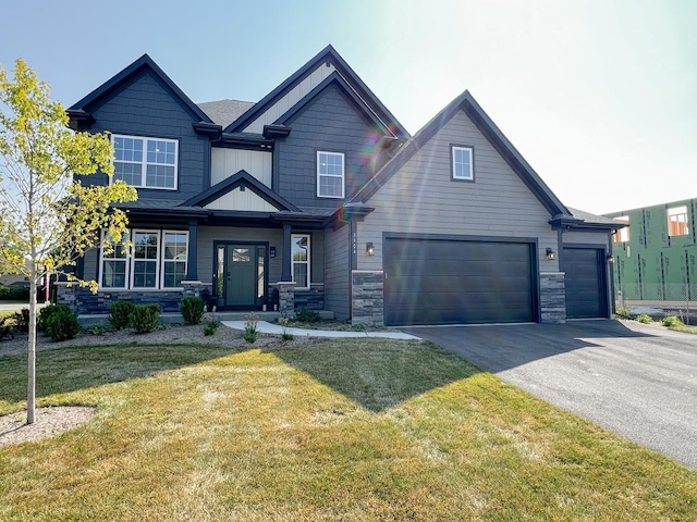 view of front facade with a front lawn and a garage