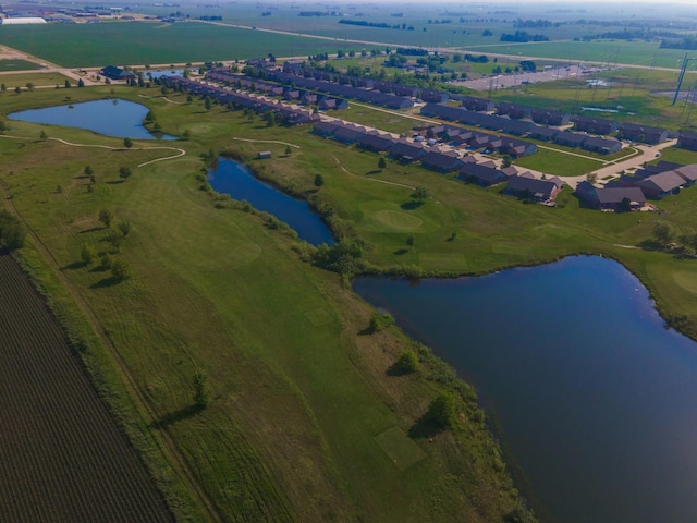 drone / aerial view with a rural view and a water view