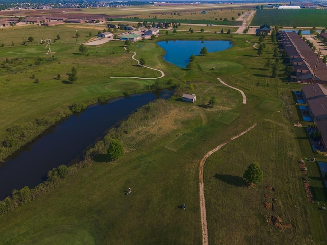 aerial view featuring a rural view and a water view