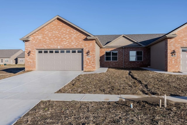 ranch-style house featuring a garage