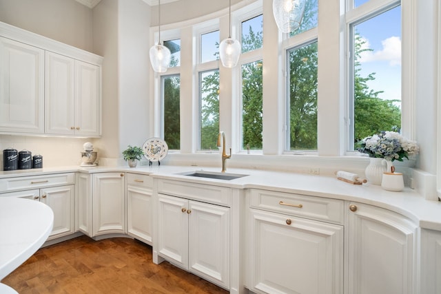 interior space with sink and light parquet flooring