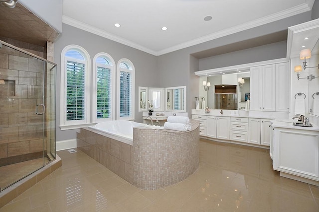 bathroom featuring tile patterned floors, vanity, separate shower and tub, and ornamental molding