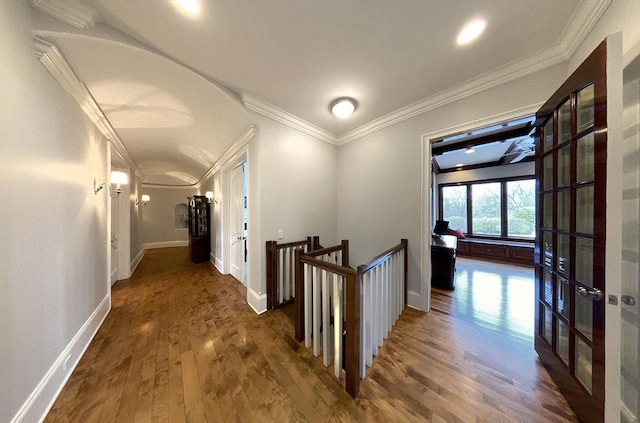 hall featuring dark hardwood / wood-style floors and ornamental molding