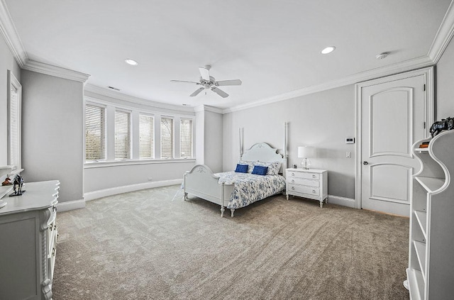 carpeted bedroom featuring ceiling fan and ornamental molding