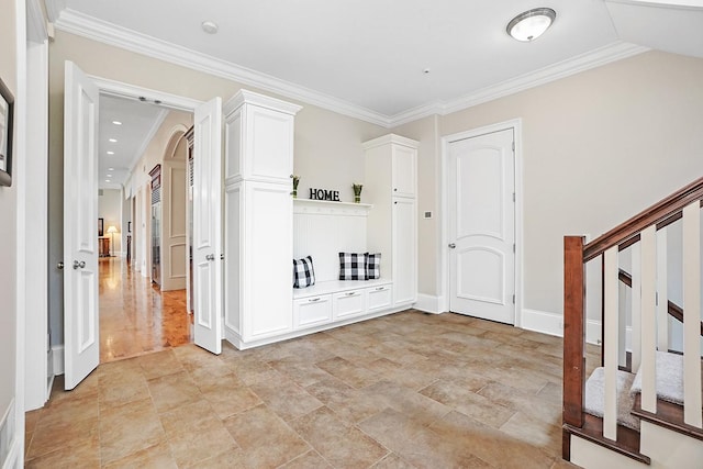 entrance foyer featuring ornamental molding