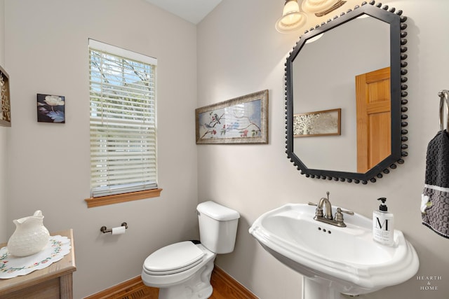 730 Fenview Cir, Algonquin, IL 60102 - half bath with a sink, wood finished floors, toilet, and baseboards