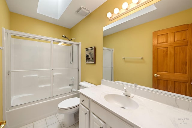 730 Fenview Cir, Algonquin, IL 60102 - full bathroom with a skylight, tile patterned floors, toilet, vanity, and shower / bath combination with glass door