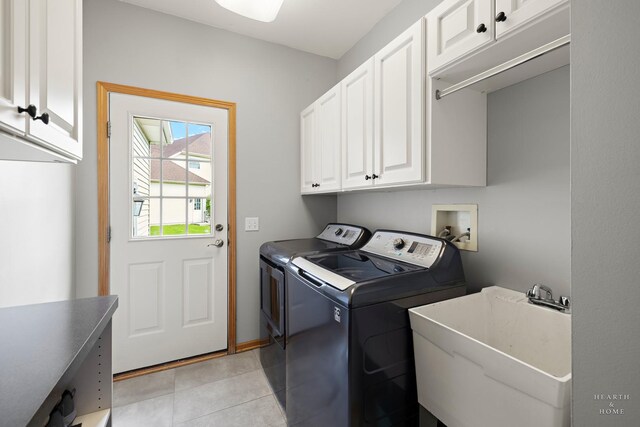 730 Fenview Cir, Algonquin, IL 60102 - laundry area with cabinet space, washer and clothes dryer, and light tile patterned floors