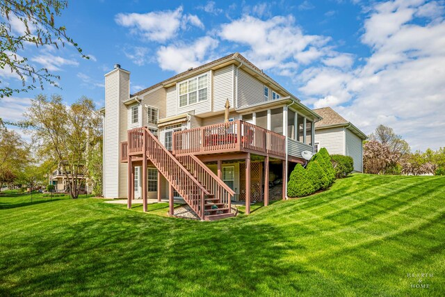730 Fenview Cir, Algonquin, IL 60102 - back of house featuring a chimney, a deck, a yard, stairs, and a sunroom