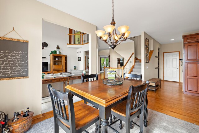730 Fenview Cir, Algonquin, IL 60102 - dining space with stairway, a chandelier, light wood-type flooring, and baseboards