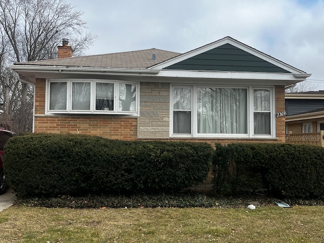 view of home's exterior with a yard