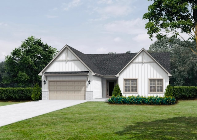 view of front facade with a front yard and a garage