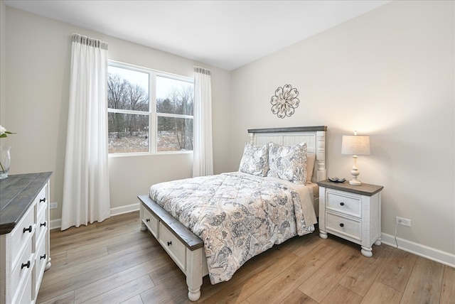 bedroom with light hardwood / wood-style floors