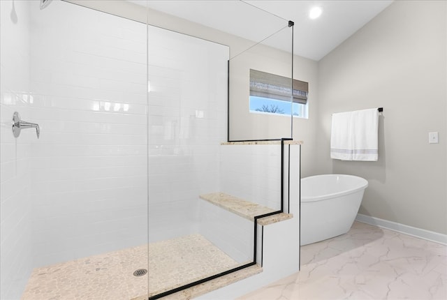 bathroom featuring plus walk in shower and tile flooring