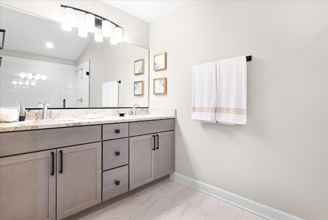 bathroom with dual bowl vanity, tile flooring, and vaulted ceiling