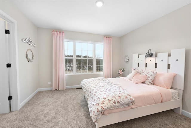 bedroom with light carpet