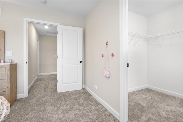 unfurnished bedroom featuring light carpet