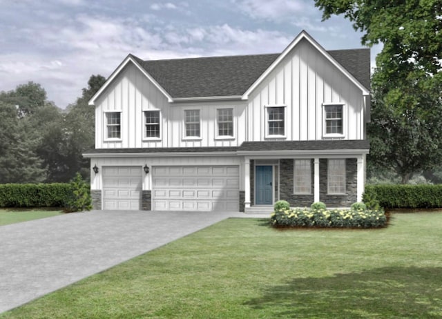 view of front facade featuring a front yard and a garage