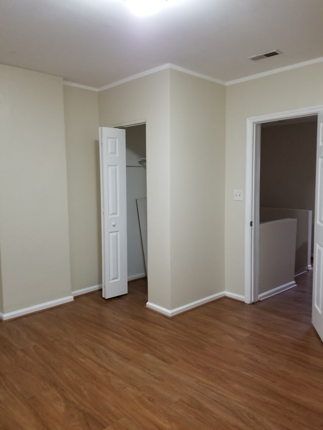 empty room featuring dark wood-type flooring