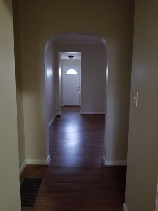 corridor featuring dark wood-type flooring