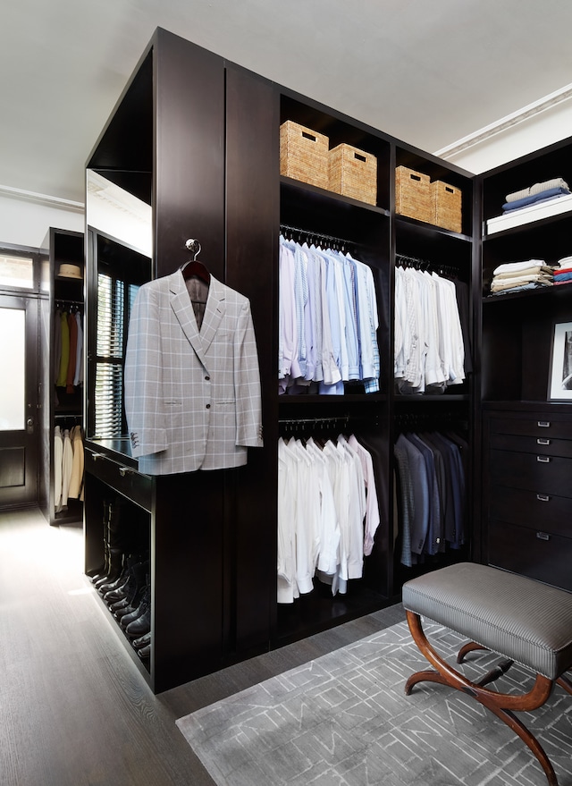 walk in closet featuring dark hardwood / wood-style flooring