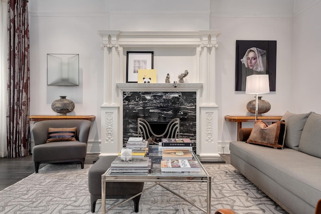 living room featuring crown molding and hardwood / wood-style floors