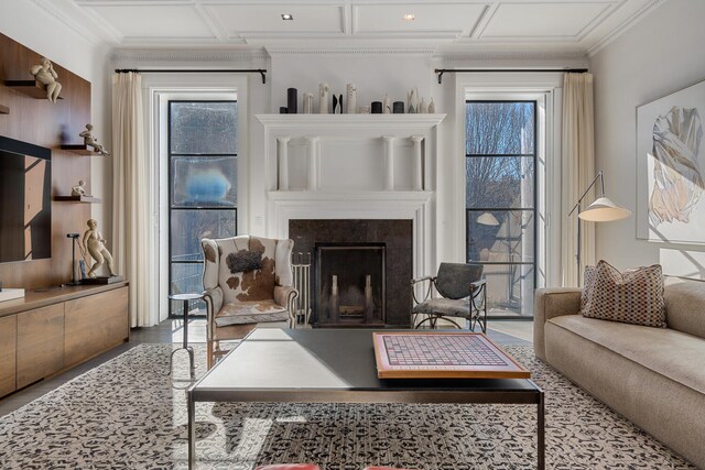 living room with crown molding, hardwood / wood-style floors, and coffered ceiling