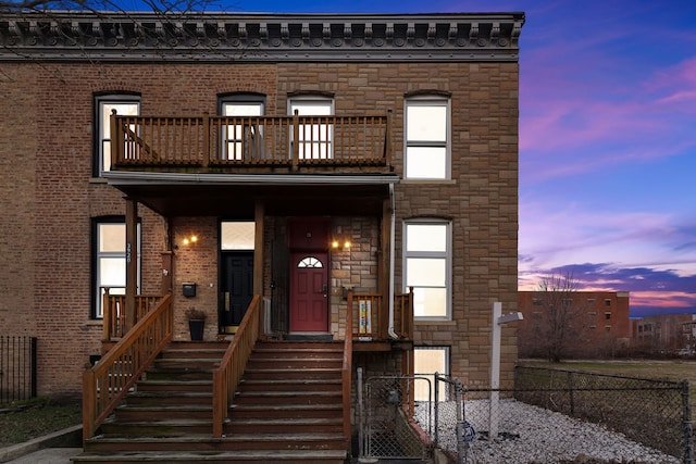 view of property with a balcony