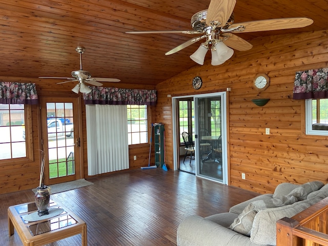 unfurnished living room with dark hardwood / wood-style floors, wooden ceiling, ceiling fan, and lofted ceiling