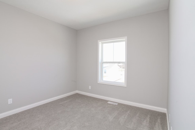 view of carpeted spare room