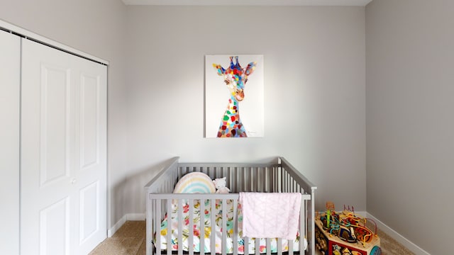 bedroom featuring carpet floors and a crib