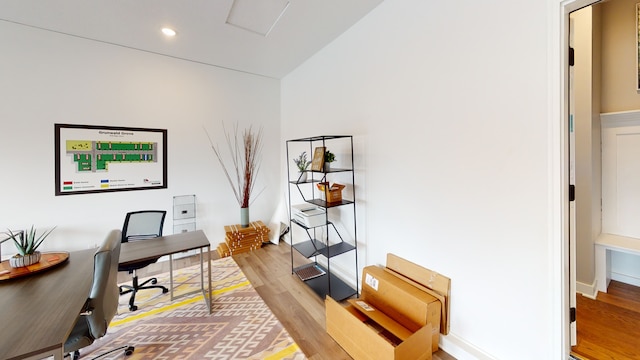 office space with light hardwood / wood-style floors