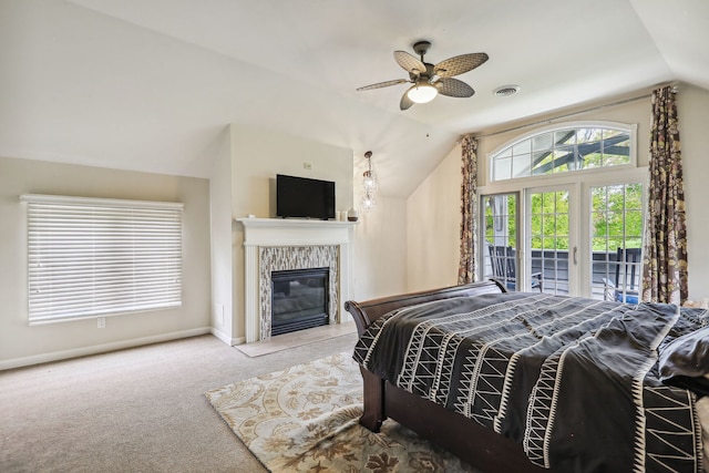 bedroom with access to outside, ceiling fan, vaulted ceiling, and light colored carpet