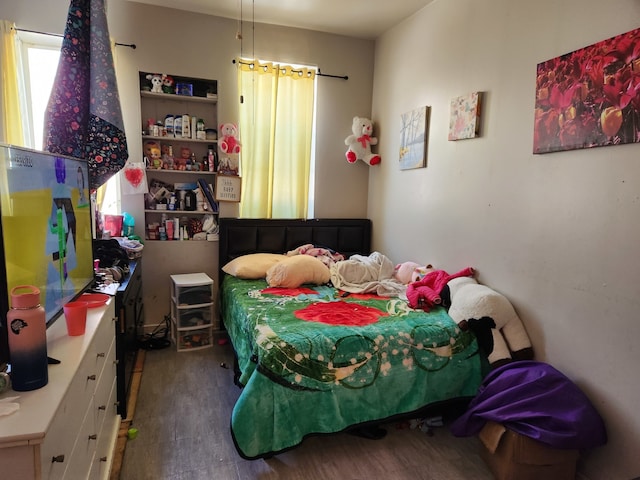 bedroom featuring hardwood / wood-style floors