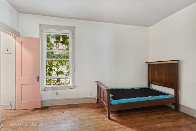 bedroom with light hardwood / wood-style flooring