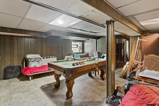 game room featuring billiards, a paneled ceiling, tile flooring, and wooden walls