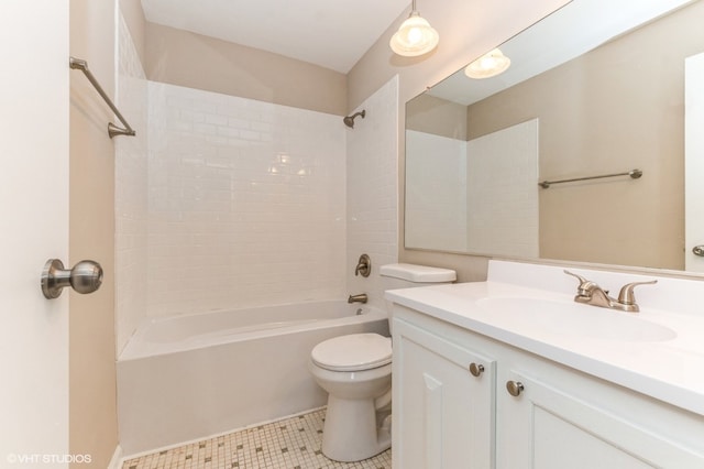 full bathroom featuring large vanity, tile floors, toilet, and shower / tub combination