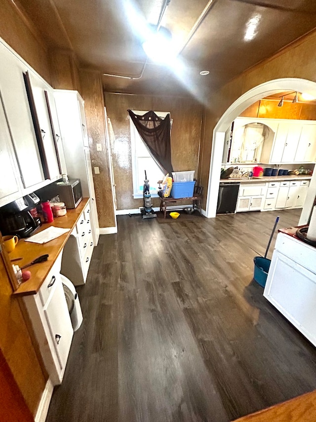 interior space with dark hardwood / wood-style flooring