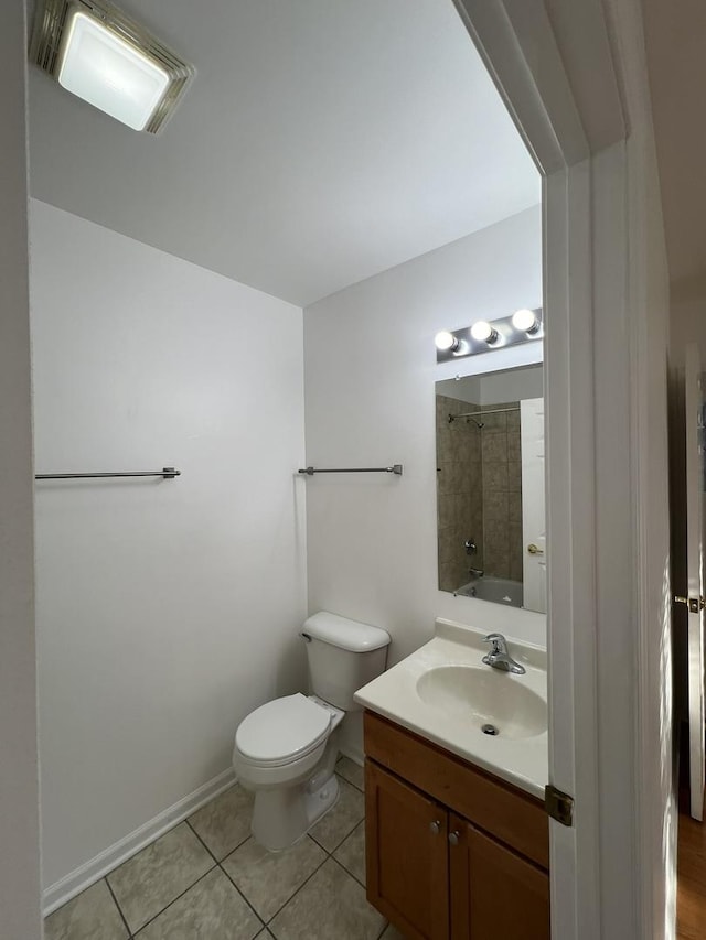 full bathroom with tile patterned flooring, vanity, shower / tub combination, and toilet