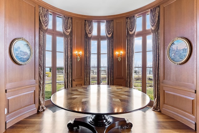 entrance foyer featuring a wealth of natural light and hardwood / wood-style floors