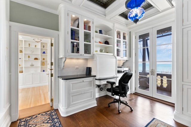 office space with ornamental molding, dark hardwood / wood-style flooring, french doors, and coffered ceiling