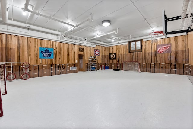 garage with wood walls