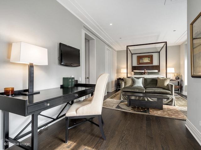 office area with ornamental molding and hardwood / wood-style floors