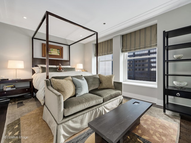 bedroom with hardwood / wood-style floors