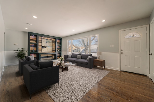 living room featuring dark wood-type flooring