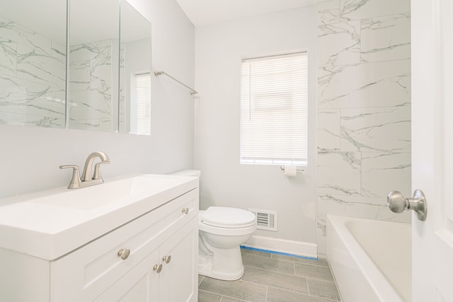 full bathroom with vanity, toilet, and shower / bath combination