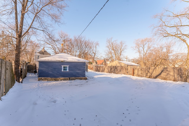 view of yard layered in snow